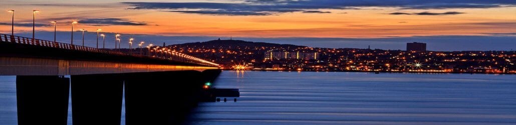Tay Bridge looking towards the skyline of Dundee at sunset