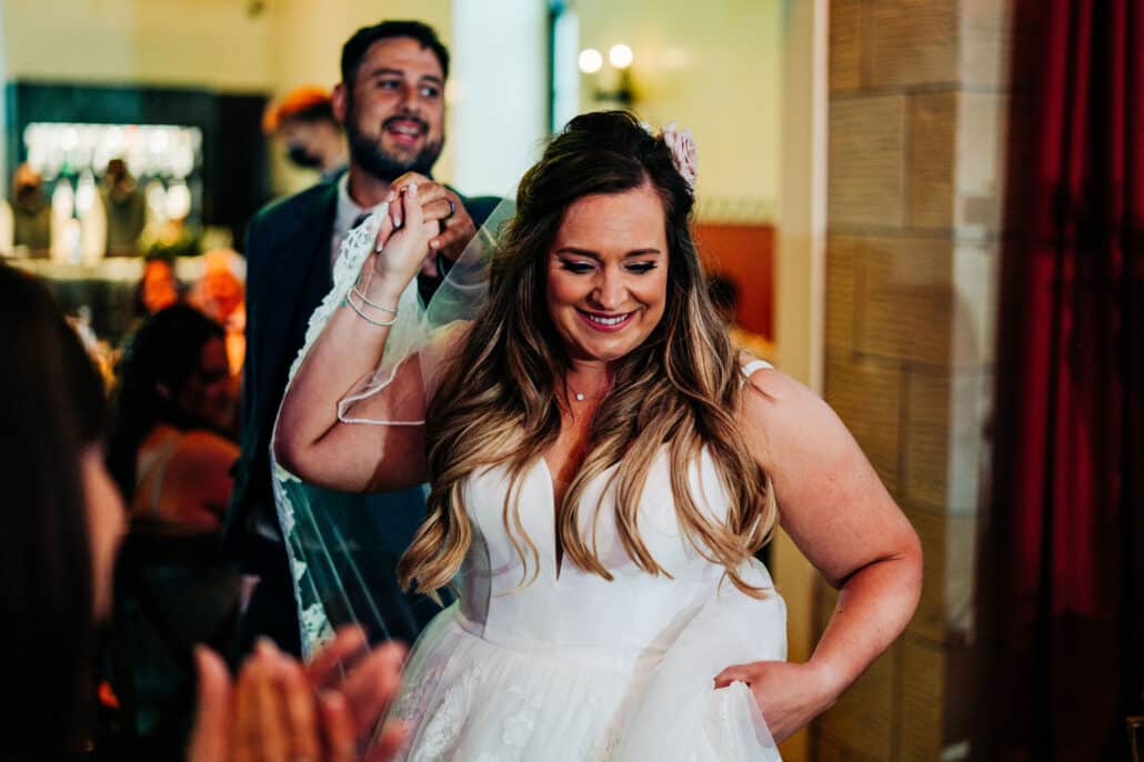 Happy bride with her husband for their first dance