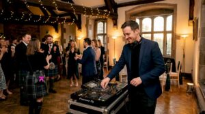 DJ and guests dancing at Scottish wedding