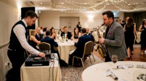 DJ and live musician performing at wedding reception