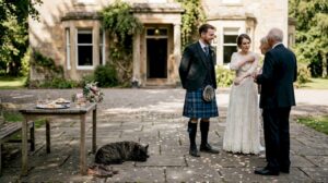 Scottish wedding couple mingling with guests