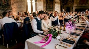 Scottish couple sharing wedding dinner moment