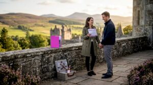 Couple planning wedding at Scottish castle